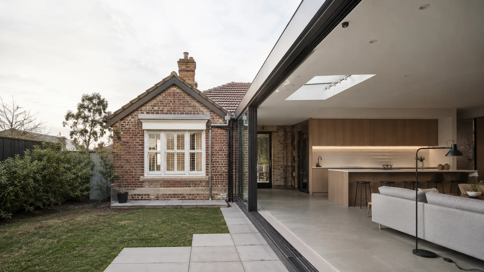 Established brick home connected to a contemporary residential extension